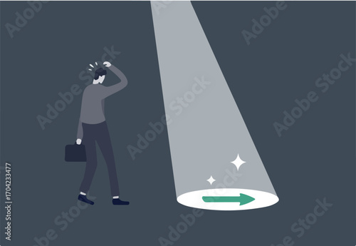 Business support or mentor help discover right direction, leadership to see business vision or career path concept, spotlight shining light on floor reveal arrow guidance to businessman in the dark.
