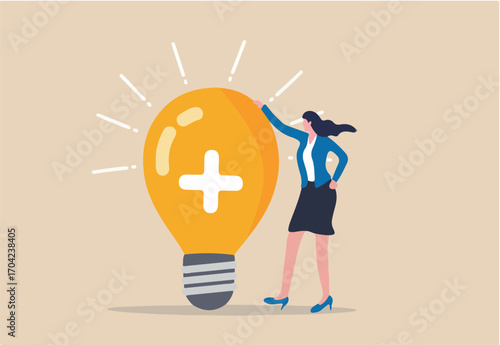 Positive thinking, optimistic bring success to work and living, inspiration and happiness in work concept, cheerful businesswoman standing with bright lightbulb idea with positive sign.
