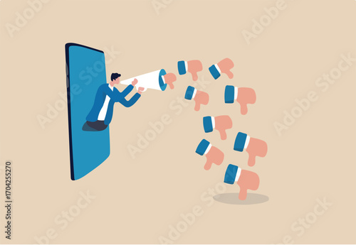 Internet hater, angry social media, dislike or negative feedback from remote work, cyber bullying concept, furious young man from mobile phone shouting on megaphone with negative thumb down symbols.