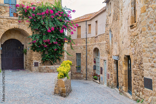 narrow street in the old town Pals, Spain