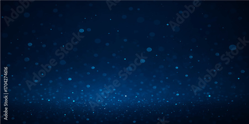 A cosmic night sky with glowing stars and blue light particles