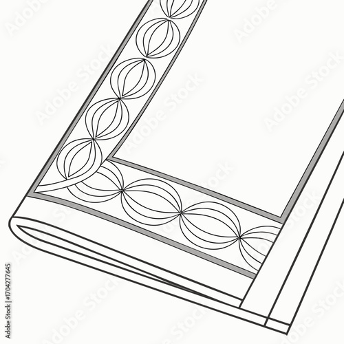A folded napkin with a circle and oval pattern