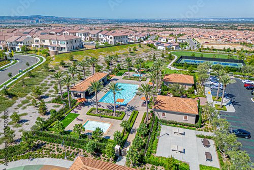 Irvine, Orange County, CA, California, August 29, 2025: Aerial Drone City View toward Olivewood at Portola Springs by New Home, Big Dipper, Portola Pkwy, Monarch Park with Homes, Houses, Streets
