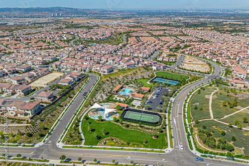 Irvine, Orange County, CA, California, August 29, 2025: Aerial Drone City View toward Olivewood at Portola Springs by New Home, Big Dipper, Portola Pkwy, Monarch Park with Homes, Houses, Streets
