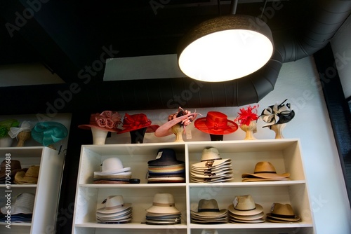 Wallpaper Mural Display of colorful hats in boutique shop interior under modern lighting Torontodigital.ca