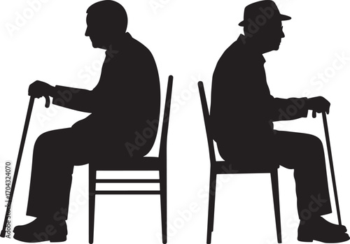 Two elderly men sitting with canes silhouette