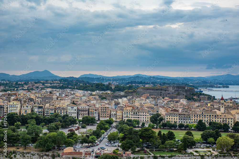 Naklejka premium Mediterranean island surrounded by the purest sea water and the historic city of Corfu Kerkyra in Greece