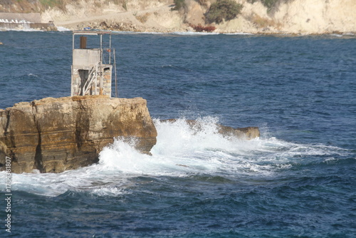 waves crashing on rocks