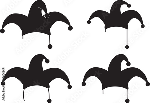 Four jester hats in black silhouette style on white background