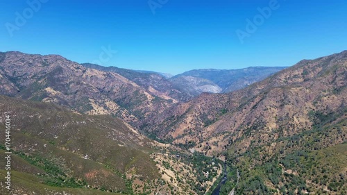 Aerial video of the mountains near Yosemite in California on a sunny day.