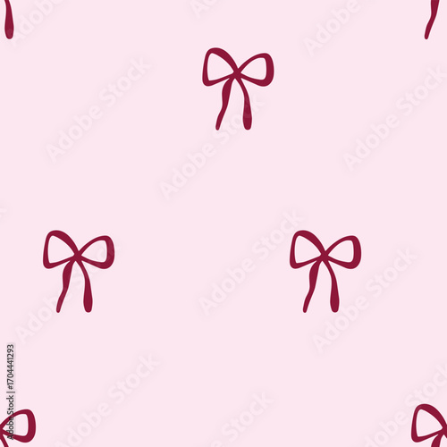 Seamless pattern with hand-drawn ribbon bows on a light pink background