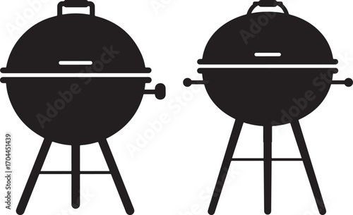 Two black barbecue grills on stands silhouette