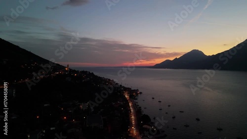 Aerial Sunset Over Lake Garda: Drone Flight from Porto di Brenzone, Brenzone sul Garda, Italy