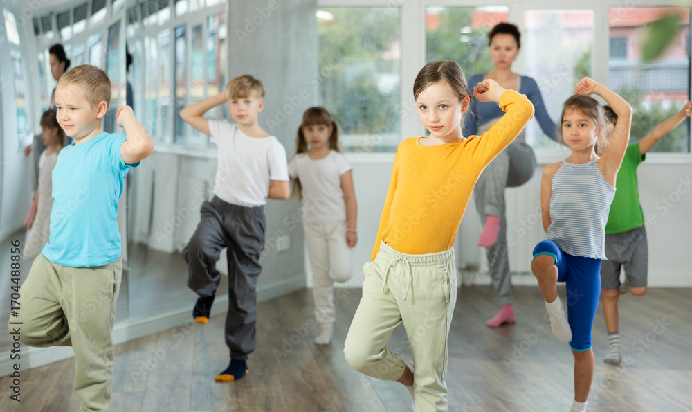 Obraz premium Group of children boys and girls dance hip hop in studio