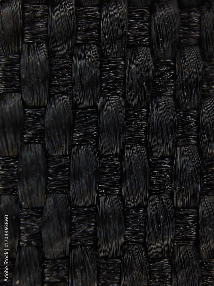 Obraz premium Macro View of Black Woven Fabric Texture Detailed Fiber Pattern Textile CloseUp.