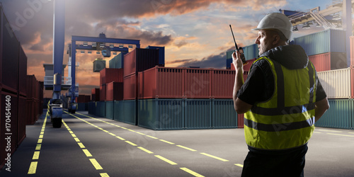 Port worker in safety vest ...