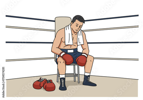 A tired boxer sits on a chair in a boxing ring, head bowed, with gloves and a towel.