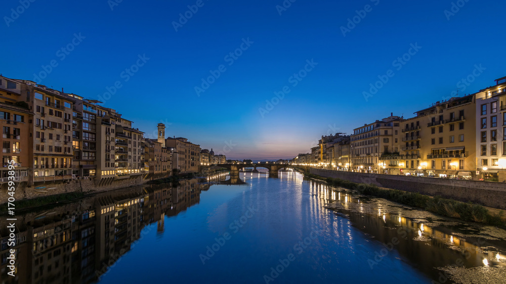 Obraz premium Ponte Santa Trinita Holy Trinity Bridge day to night timelapse over River Arno in Florence