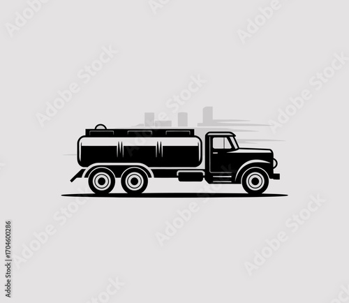 The dynamic silhouette of a fuel truck in motion presents a modern industrial feel, making it ideal for conveying concepts of speed and efficiency in stock images.