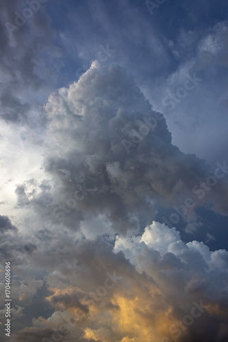 Dramatic storm clouds before a thunder-storm at sunset.