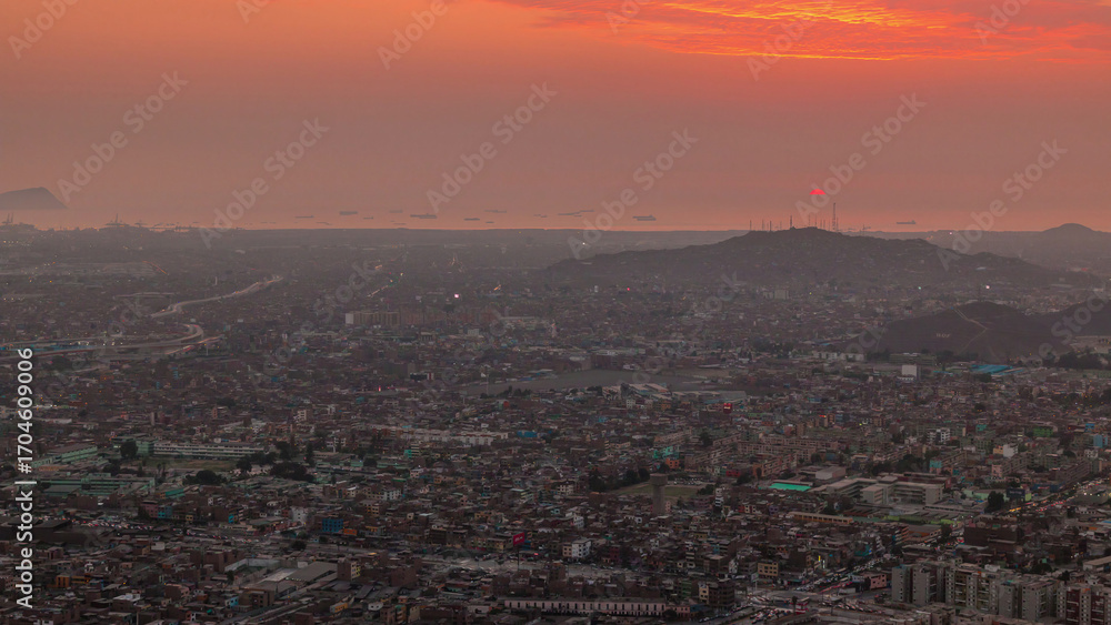Fototapeta premium Aerial sunset view of Lima skyline timelapse from San Cristobal hill.