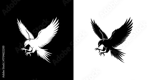 Striking black and white silhouette of a powerful eagle in mid-flight, a dynamic vector design symbolizing strength, freedom, and predation