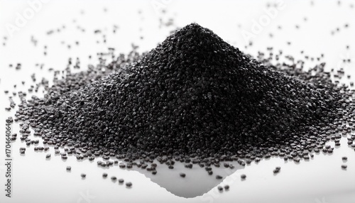 Black Sugar Sprinkles Creating A Textured Surface On White Background