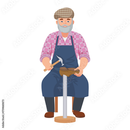 Skilled senior shoemaker in an apron and cap mending a leather shoe with a hammer
