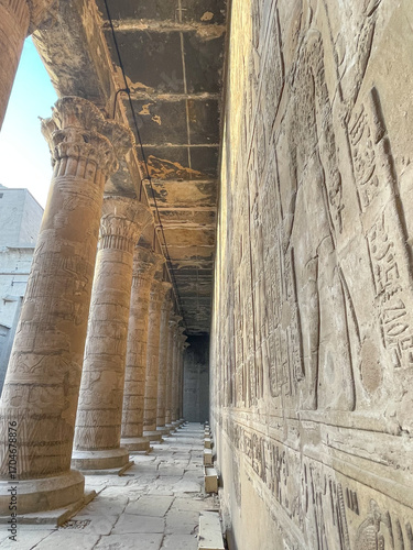 Grand columns and hawk statue stand at the massive temple,Edfu Temple, Egypt, temple, Horus, ancient, historic, landmark

