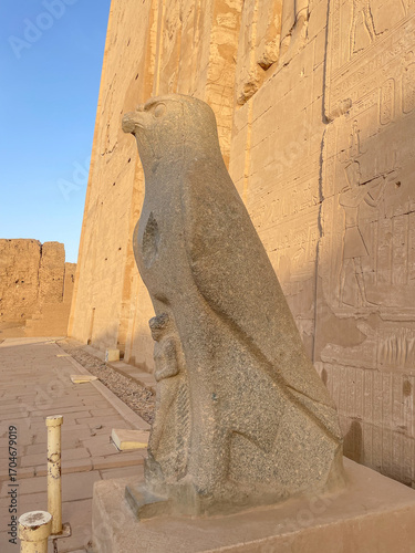 Grand columns and hawk statue stand at the massive temple,Edfu Temple, Egypt, temple, Horus, ancient, historic, landmark
