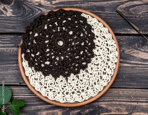 Crocheted Yin-Yang design on a plate