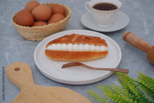 Delicious Cream-Filled Almond Pastry with Eggs and Tea