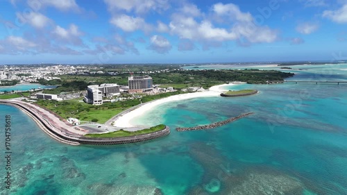 沖縄リゾートの夕日と波が輝くビーチ空撮
Luxury Resort Sunset Beach with Waves from Above