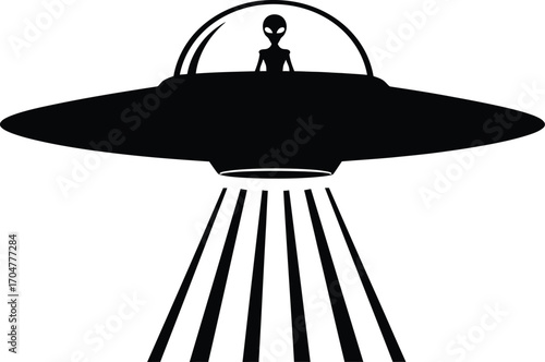 Silhouette of an alien in a flying saucer beaming down from space
