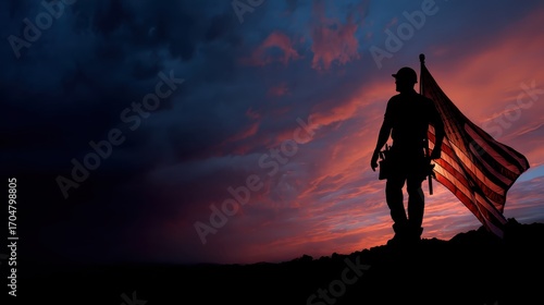Construction Worker Silhouette Holding American Flag Against a Stunning Sunset Background, Capturing a Moment of Patriotism and Hard Work in a Natural Landscape