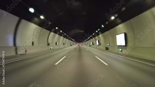 Tunnel interior perspective driving through modern transportation infrastructure