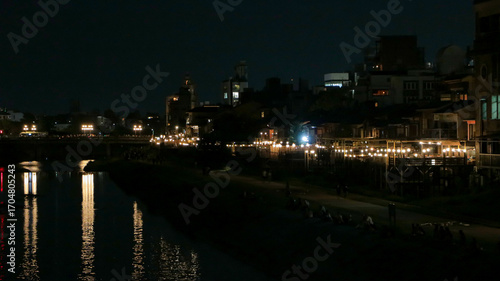 Night view of the Kamogawa River's summer-time riverside terrace