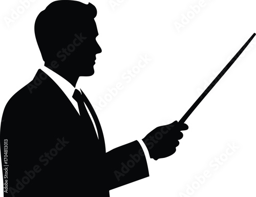 A businessman in a suit is standing and pointing with a stick, he is giving a presentation or explaining something, and the stick is used as a pointer