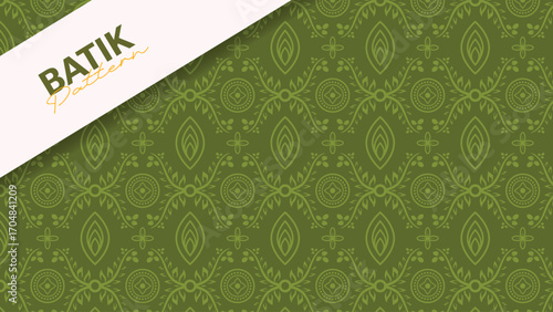 A repeating batik pattern featuring floral motifs on green background, suitable for traditional and modern designs.