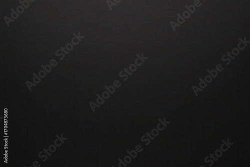 Elegant charcoal black paper texture with subtle fiber grain and soft shadow gradients premium dark background for luxury branding and minimalist design