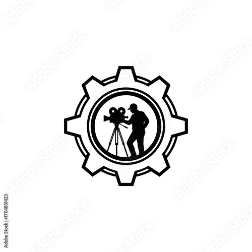 Silhouette of a filmmaker working with a camera inside a gear, symbolizing the process of filmmaking.