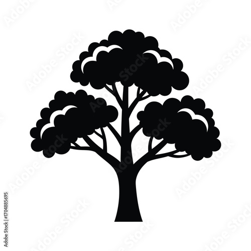Silhouette of a tree with a full, rounded crown, isolated on white background the tree has a thick trunk and branches spreading out to support the foliage