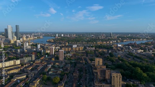 Wallpaper Mural Aerial footage of London highlighting the River Thames, modern corporate skyscrapers, and surrounding residential areas. The city’s skyline blends historic and contemporary architecture. Torontodigital.ca
