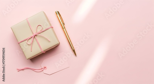 Wallpaper Mural Elegant Gift Box Pink Background Gold Pen Minimalist Branding Design Torontodigital.ca