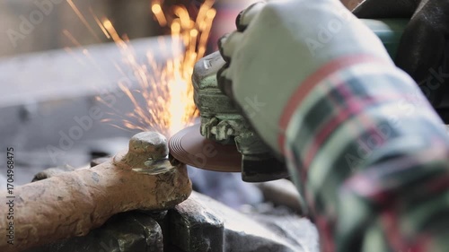 Zoom Back View Construction Industrial Factory or Metalwork Concept by Mechanic or Technician Using Grinder with Ball Joint Auto Part
