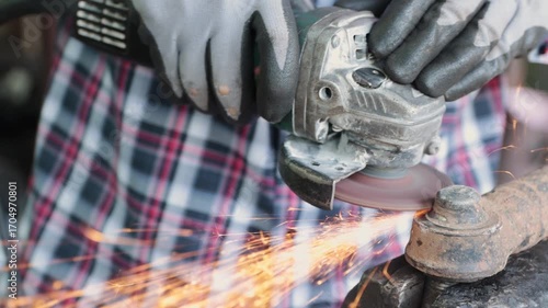 Track Shot Zoom Front View Construction Industrial Factory or Metalwork Concept by Mechanic or Technician Using Grinder with Auto Part Workshop