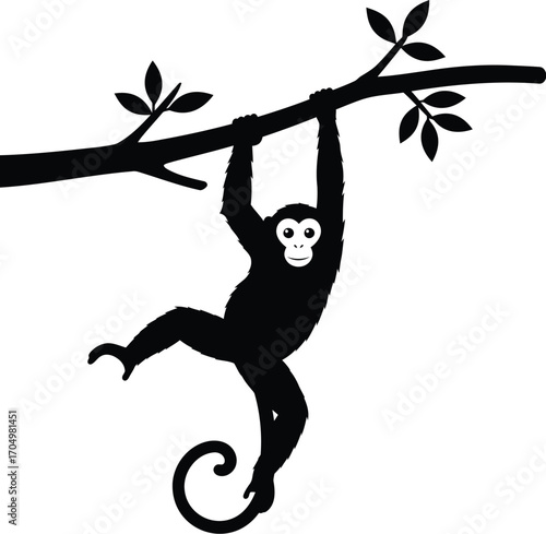 Black silhouette of a monkey hanging from a tree branch with leaves	