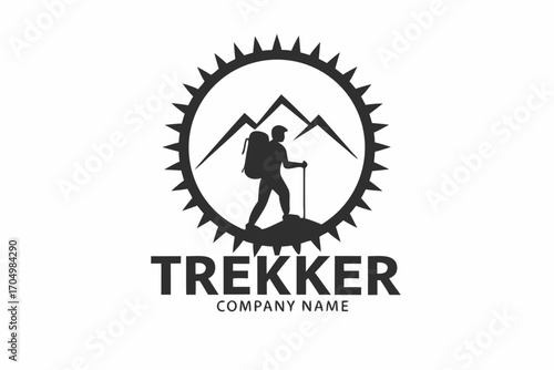 Hiker silhouette ascends mountain inside circular frame, wearing backpack and using hiking stick
