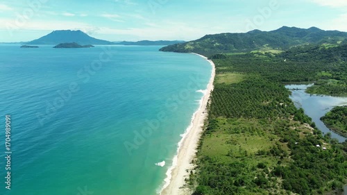 Wallpaper Mural High-altitude drone panorama of Long Beach in San Vicente, Palawan, showing the long palm-lined shoreline, turquoise water and distant islands on a clear tropical day. Torontodigital.ca