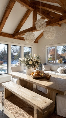 Welcoming dining area with wooden table and natural light in a modern home during the day